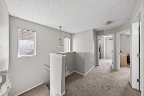 244 Silverado Range View Sw, Calgary, AB - Indoor Photo Showing Other Room