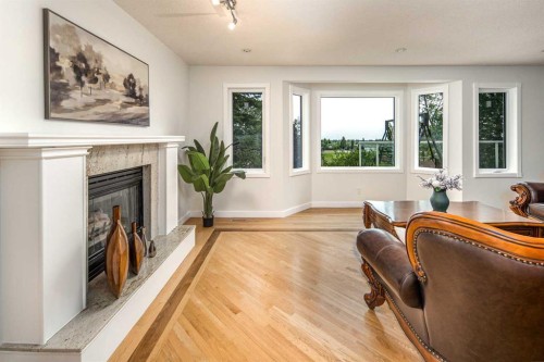 2612 Signal Hill Drive Sw, Calgary, AB - Indoor Photo Showing Living Room With Fireplace