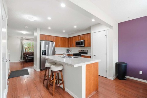 26 Copperpond Place Se, Calgary, AB - Indoor Photo Showing Kitchen With Double Sink