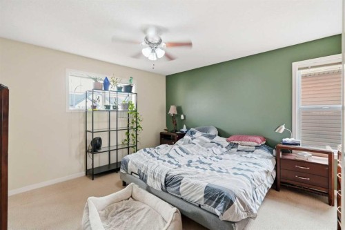 26 Copperpond Place Se, Calgary, AB - Indoor Photo Showing Bedroom