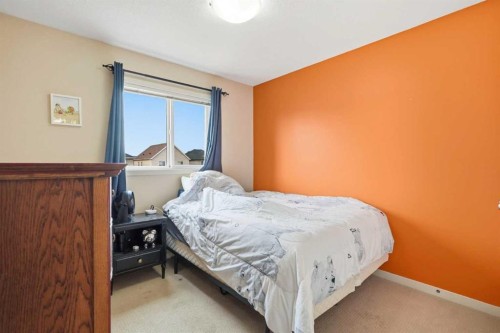 26 Copperpond Place Se, Calgary, AB - Indoor Photo Showing Bedroom