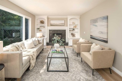 79 Hamptons Heights Nw, Calgary, AB - Indoor Photo Showing Living Room With Fireplace
