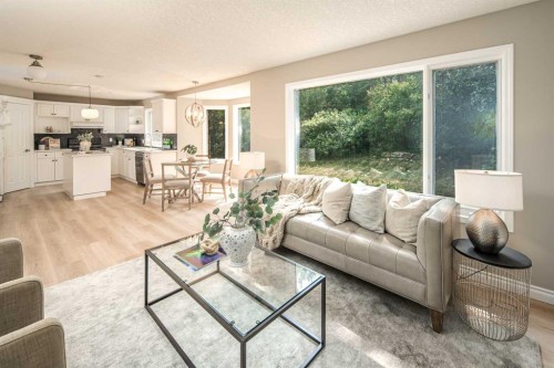 79 Hamptons Heights Nw, Calgary, AB - Indoor Photo Showing Living Room