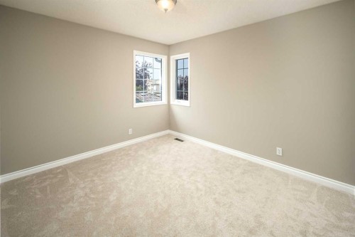 79 Hamptons Heights Nw, Calgary, AB - Indoor Photo Showing Other Room