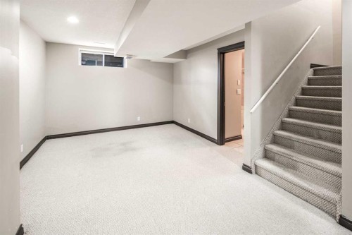 79 Hamptons Heights Nw, Calgary, AB - Indoor Photo Showing Other Room
