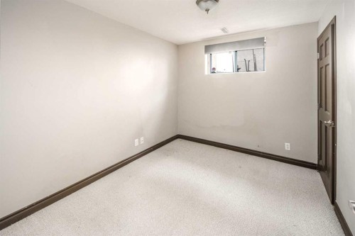 79 Hamptons Heights Nw, Calgary, AB - Indoor Photo Showing Other Room