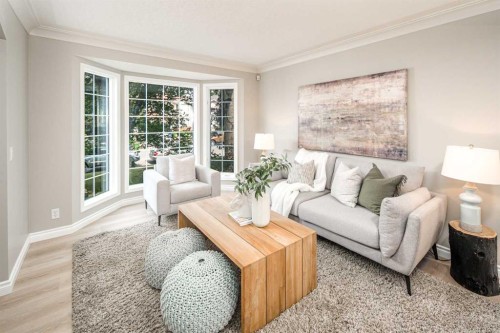 79 Hamptons Heights Nw, Calgary, AB - Indoor Photo Showing Living Room