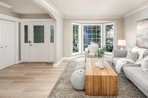 79 Hamptons Heights Nw, Calgary, AB - Indoor Photo Showing Living Room