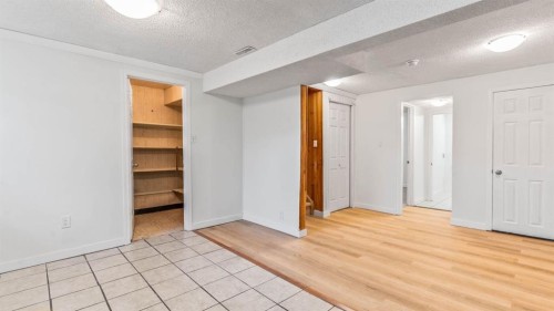 15 Taraglen Court Ne, Calgary, AB - Indoor Photo Showing Other Room