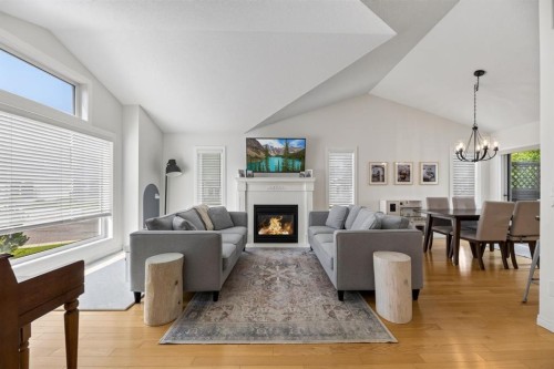 6202 Davis Place, Olds, AB - Indoor Photo Showing Living Room With Fireplace