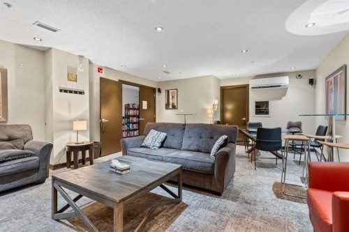 320-11 Millrise Drive Sw, Calgary, AB - Indoor Photo Showing Living Room