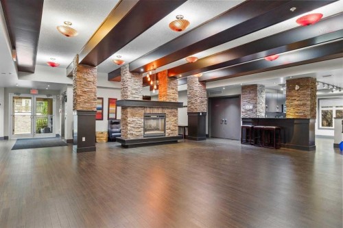 320-11 Millrise Drive Sw, Calgary, AB - Indoor With Fireplace
