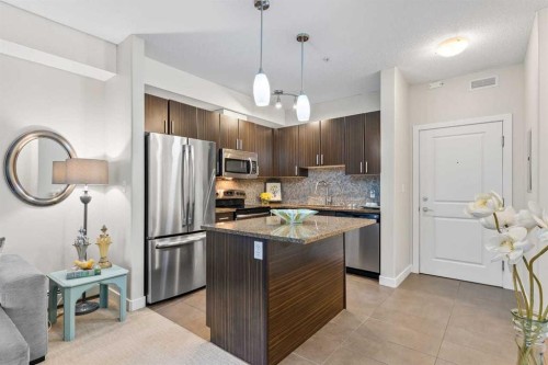 320-11 Millrise Drive Sw, Calgary, AB - Indoor Photo Showing Kitchen With Stainless Steel Kitchen With Upgraded Kitchen
