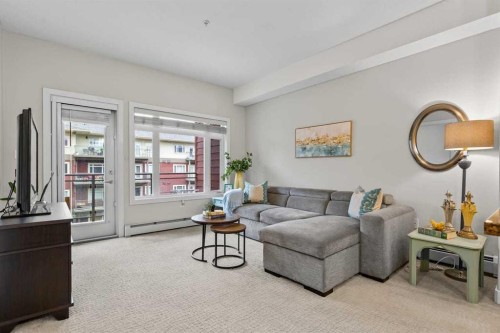 320-11 Millrise Drive Sw, Calgary, AB - Indoor Photo Showing Living Room