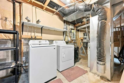 100 Coventry Road Ne, Calgary, AB - Indoor Photo Showing Laundry Room