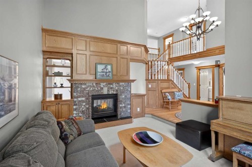 134 Schiller Crescent Nw, Calgary, AB - Indoor Photo Showing Living Room With Fireplace