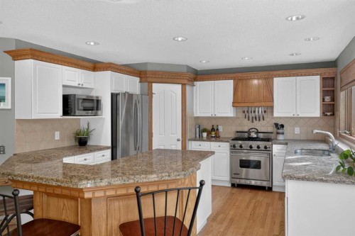 134 Schiller Crescent Nw, Calgary, AB - Indoor Photo Showing Kitchen With Stainless Steel Kitchen
