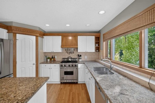 134 Schiller Crescent Nw, Calgary, AB - Indoor Photo Showing Kitchen With Stainless Steel Kitchen With Double Sink
