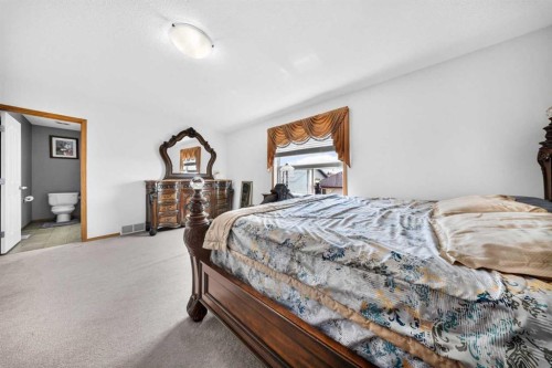 154 Saddleland Close Ne, Calgary, AB - Indoor Photo Showing Bedroom