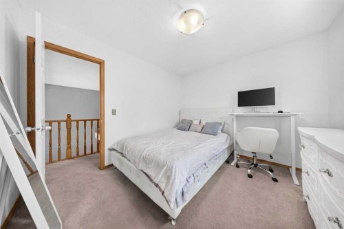 154 Saddleland Close Ne, Calgary, AB - Indoor Photo Showing Bedroom