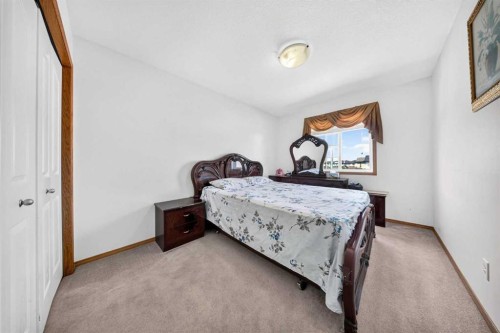 154 Saddleland Close Ne, Calgary, AB - Indoor Photo Showing Bedroom