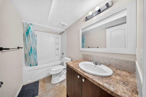 154 Saddleland Close Ne, Calgary, AB - Indoor Photo Showing Bathroom