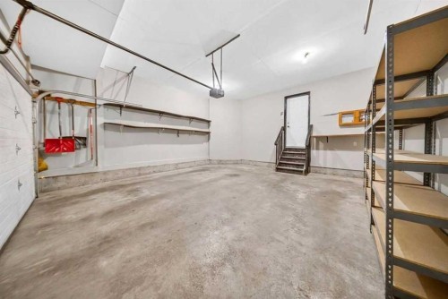 154 Saddleland Close Ne, Calgary, AB - Indoor Photo Showing Garage