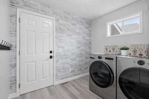 122 Sceptre Close Nw, Calgary, AB - Indoor Photo Showing Laundry Room