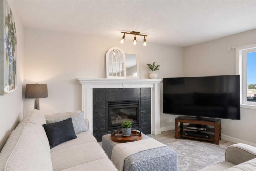 122 Sceptre Close Nw, Calgary, AB - Indoor Photo Showing Living Room With Fireplace