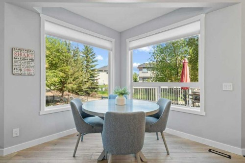 100 Drake Landing Common, Okotoks, AB - Indoor Photo Showing Dining Room