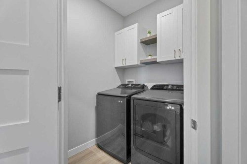 100 Drake Landing Common, Okotoks, AB - Indoor Photo Showing Laundry Room