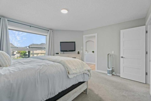 100 Drake Landing Common, Okotoks, AB - Indoor Photo Showing Bedroom