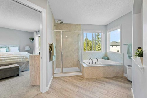 100 Drake Landing Common, Okotoks, AB - Indoor Photo Showing Bedroom