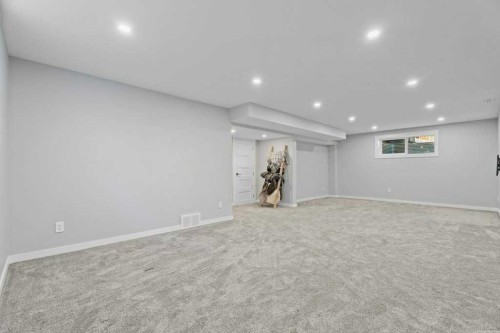 100 Drake Landing Common, Okotoks, AB - Indoor Photo Showing Other Room