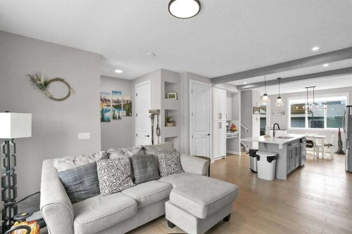 1139 Lanark Boulevard Se, Airdrie, AB - Indoor Photo Showing Living Room