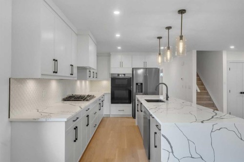816 Lake Ontario Drive Se, Calgary, AB - Indoor Photo Showing Kitchen With Upgraded Kitchen