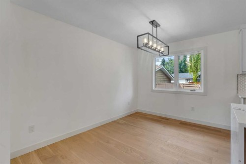 816 Lake Ontario Drive Se, Calgary, AB - Indoor Photo Showing Other Room
