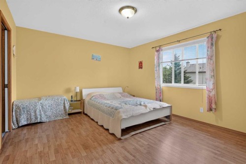 45 Arbour Crest Terrace Nw, Calgary, AB - Indoor Photo Showing Bedroom