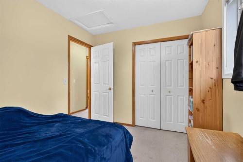 45 Arbour Crest Terrace Nw, Calgary, AB - Indoor Photo Showing Bedroom
