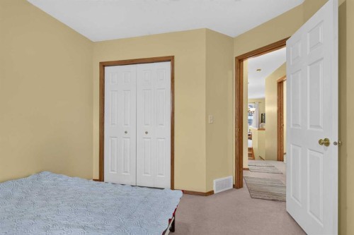 45 Arbour Crest Terrace Nw, Calgary, AB - Indoor Photo Showing Bedroom