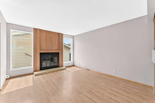 128 Erin Woods Drive Se, Calgary, AB - Indoor With Fireplace