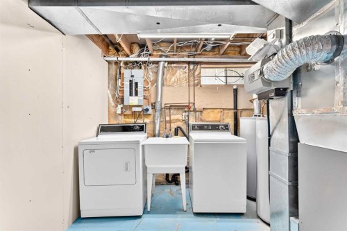 128 Erin Woods Drive Se, Calgary, AB - Indoor Photo Showing Laundry Room