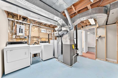 128 Erin Woods Drive Se, Calgary, AB - Indoor Photo Showing Laundry Room