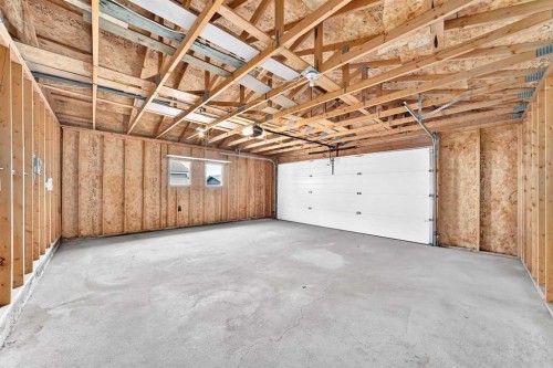 128 Erin Woods Drive Se, Calgary, AB - Indoor Photo Showing Garage
