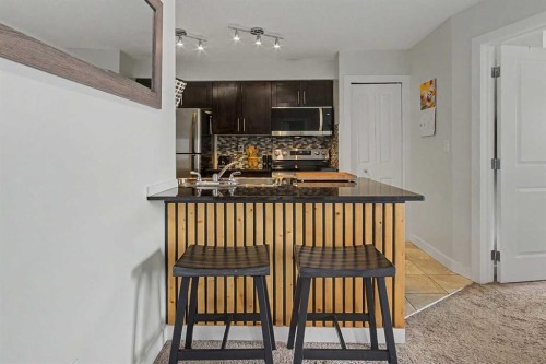 3407-403 Mackenzie Way Sw, Airdrie, AB - Indoor