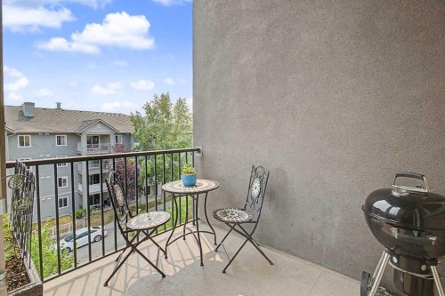 3407-403 Mackenzie Way Sw, Airdrie, AB - Outdoor