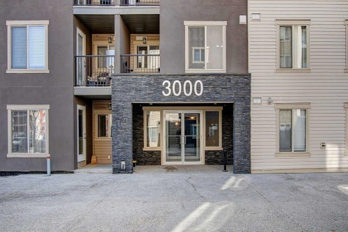 3407-403 Mackenzie Way Sw, Airdrie, AB - Outdoor With Facade