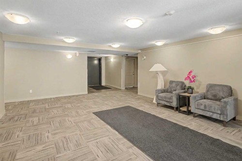 3407-403 Mackenzie Way Sw, Airdrie, AB - Indoor Photo Showing Other Room