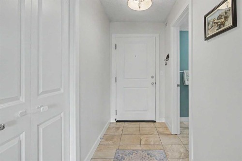 3407-403 Mackenzie Way Sw, Airdrie, AB - Indoor Photo Showing Other Room