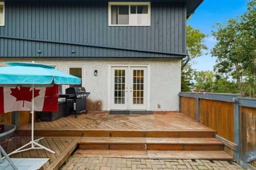 12-800 Bowcroft Place, Cochrane, AB - Outdoor With Exterior